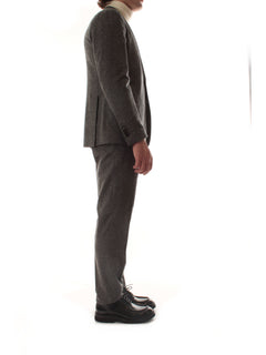 Tagliatore abito monopetto grigio da uomo