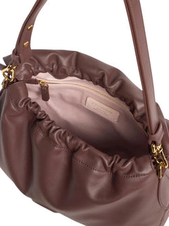 Coccinelle Lidia small da donna berry